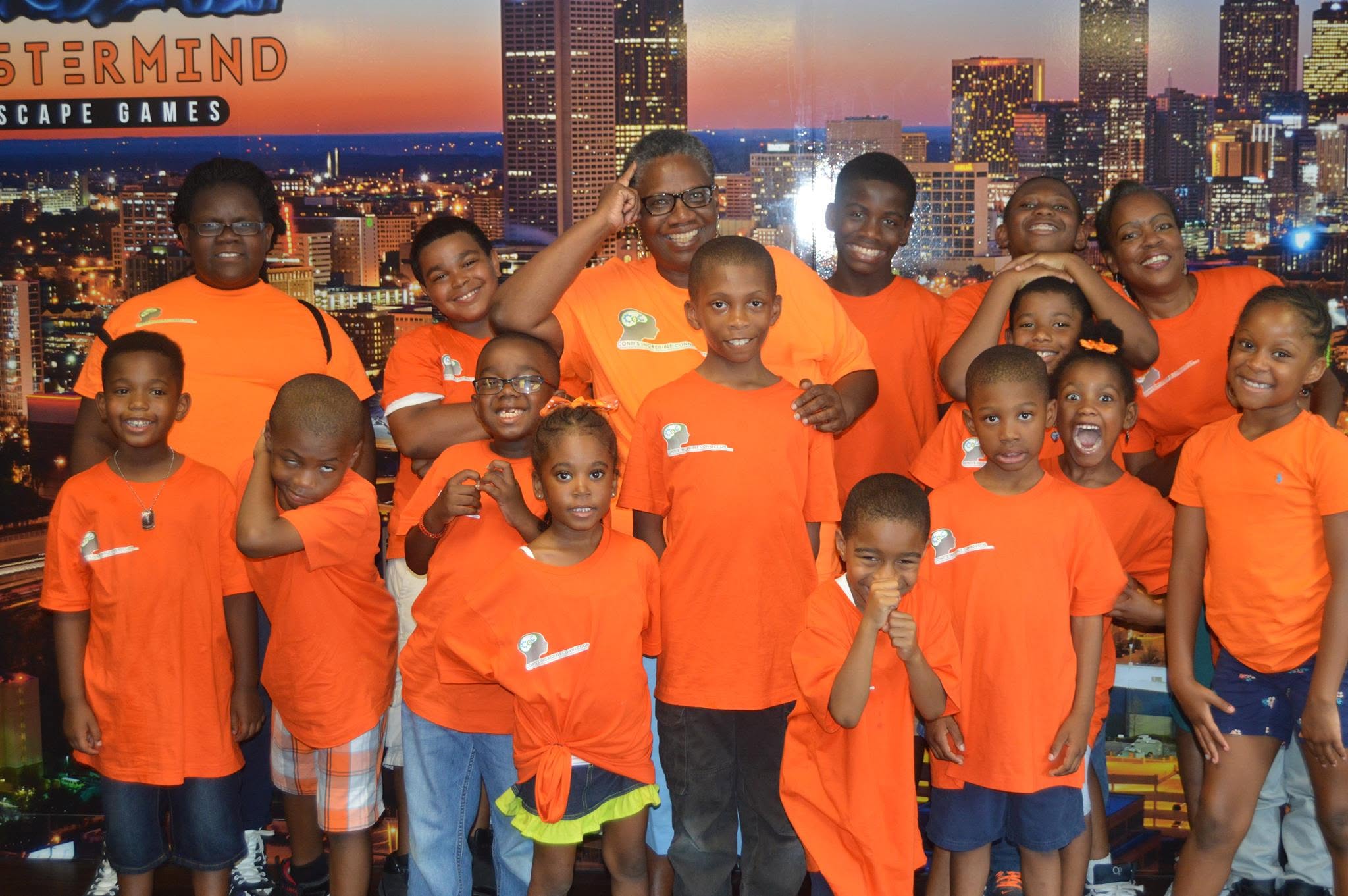 Conti's Incredible Connection students in orange shirts